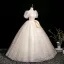 Elegant Champagne Printing Prom Dresses 2025 Ball Gown Square Neckline Bow Puffy Short Sleeve Backless Floor-Length / Long Prom Formal Dresses