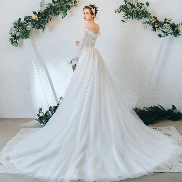 Chic Ivoire Robe De Mariée 2020 Princesse Encolure Dégagée Perle En Dentelle Fleur Manches Longues Tribunal Train