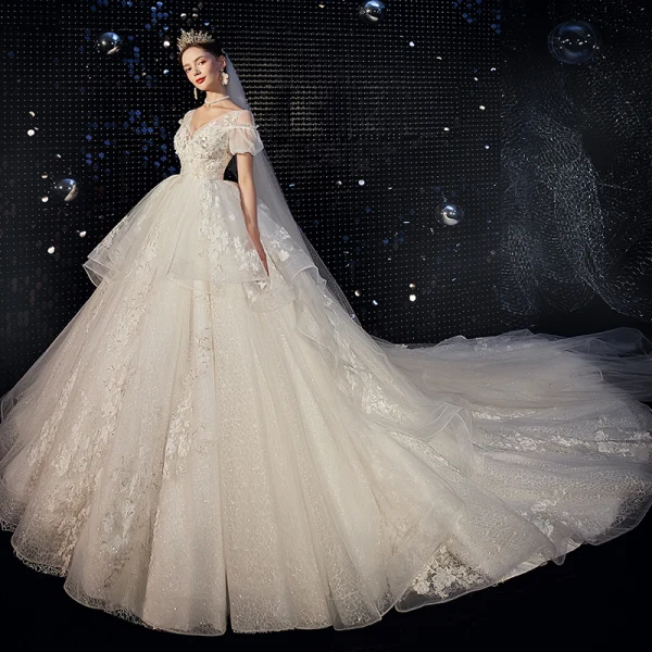 High-end Ivory Wedding Dresses 2020 Ball Gown V-Neck Beading Pearl Sequins Lace Flower Appliques Short Sleeve Backless Royal Train