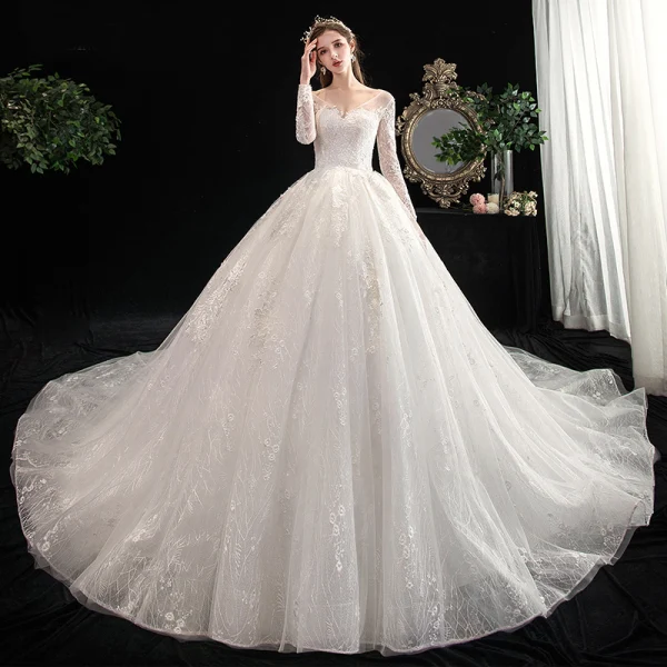 Charmant Ivoire Robe De Mariée 2020 Princesse V-Cou Perlage En Dentelle Fleur 3/4 Manches Dos Nu Cathedral Train