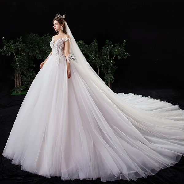 Charmant Ivoire Robe De Mariée 2020 Princesse Encolure Dégagée Perlage Perle Paillettes En Dentelle Fleur Manches Longues Cathedral Train