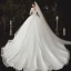 Elegant Ivory Wedding Dresses 2020 Ball Gown Deep V-Neck Pearl Lace Flower Appliques Short Sleeve Backless Cathedral Train