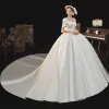 High-end Elegant Ivory Satin Wedding Dresses 2021 Ball Gown Pearl Square Neckline Short Sleeve Backless Bow Royal Train Wedding