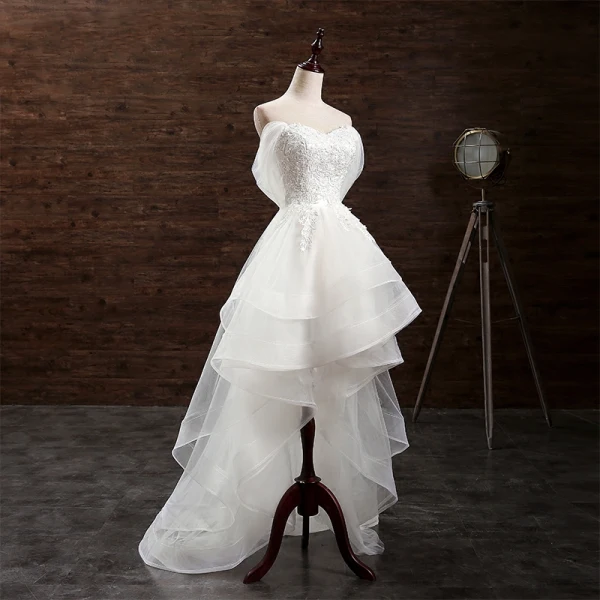 Romantisk Strand Brudekjoler 2017 Kjæreste Uten Ermer Appliques Blonder Buste Ryggløse Elfenben Organza Asymmetrisk
