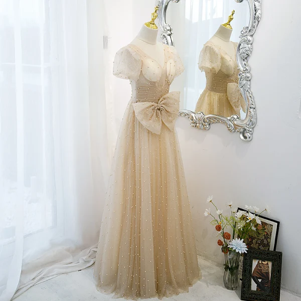 Élégant Champagne Robe De Bal Princesse 2021 V-Cou Noeud Paillettes Perle Manches Courtes Dos Nu Longue Robe De Ceremonie