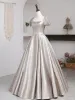 Sparkly Silver Glitter Sequins Satin Prom Dresses 2021 A-Line / Princess Square Neckline Spotted Short Sleeve Backless Floor-Length / Long Formal Dresses