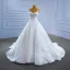 High-end White Glitter Wedding Dresses 2021 Ball Gown Sleeveless Sequins Rhinestone Spaghetti Straps Cathedral Train Wedding