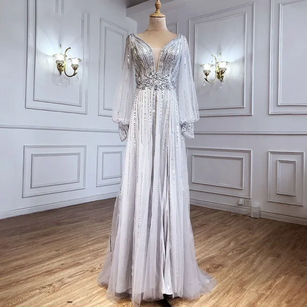 Charmant High End Beige Abendkleider 2021 A Linie V-Ausschnitt Perlenstickerei Strass Pailletten Lange Ärmel Rückenfreies Sweep / Pinsel Zug Abend Festliche Kleider
