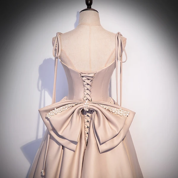 Elegante Champagner Satin Ballkleider 2022 A Linie Spaghettiträger Perlenstickerei Perle Ärmellos Rückenfreies Schleife Lange Festliche Kleider