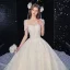 Luxe Champagne Robe De Mariée 2020 Princesse Encolure Dégagée Perlage Gland Paillettes En Dentelle Fleur Manches Courtes Dos Nu Royal Train