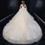 Luxe Champagne Robe De Mariée 2020 Robe Boule Bustier Plumes Perlage En Dentelle Fleur Sans Manches Dos Nu Volants en Cascade Royal Train