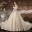 Charmant Champagne Robe De Mariée 2020 Princesse Encolure Dégagée Perlage Paillettes En Dentelle Fleur 3/4 Manches Dos Nu Cathedral Train