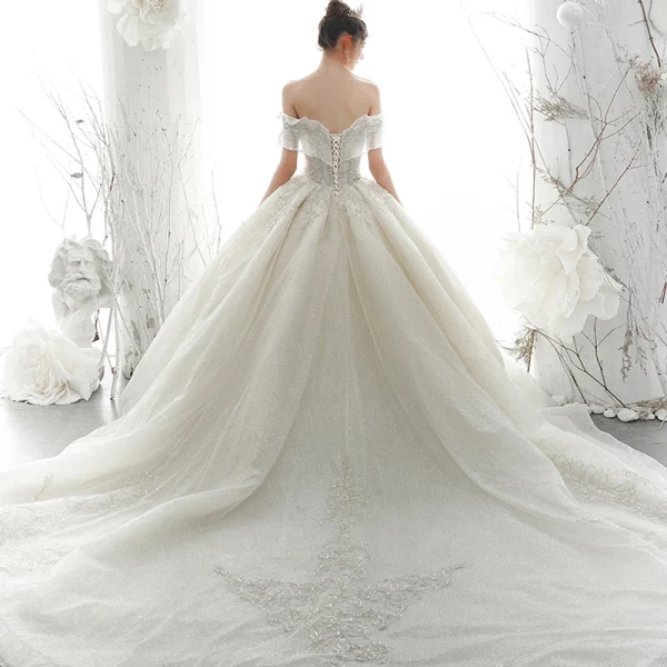 Luxury / Gorgeous Ivory Wedding Dresses 2020 Ball Gown Off-The-Shoulder Beading Glitter Sequins Pearl Lace Flower Short Sleeve Backless Royal Train