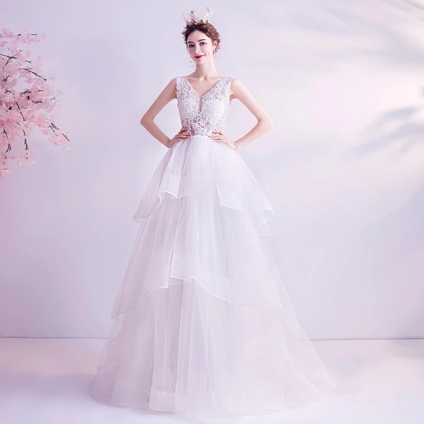 Abordable Blanche Robe De Mariée 2020 Princesse V-Cou En Dentelle Fleur Sans Manches Dos Nu Volants en Cascade Train De Balayage