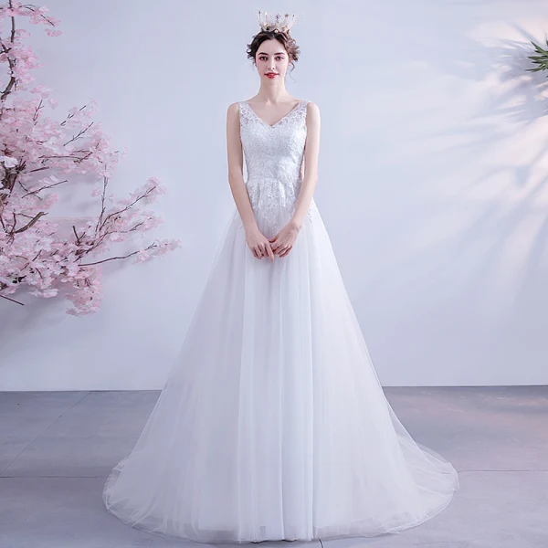 Abordable Blanche Robe De Mariée 2020 Princesse V-Cou Faux Diamant En Dentelle Fleur Appliques Sans Manches Dos Nu Tribunal Train