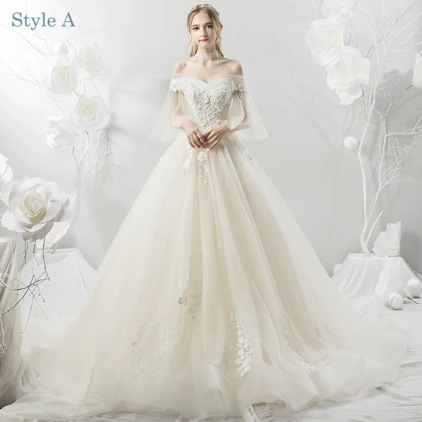 Elegant Champagne Wedding Dresses 2018 Ball Gown Lace Appliques Beading Pearl Off-The-Shoulder Backless Short Sleeve Cathedral Train Wedding