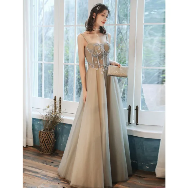 Charmant Champagne Robe De Soirée 2020 Princesse Bretelles Spaghetti Perlage En Dentelle Fleur Sans Manches Dos Nu Longue Robe De Ceremonie