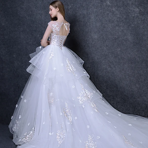 Elegant White Wedding Dresses 2018 Ball Gown Beading Appliques Bow Scoop Neck Backless Sleeveless Cathedral Train Wedding