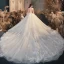 Luxe Champagne Robe De Mariée 2020 Robe Boule Encolure Dégagée Perlage Faux Diamant Paillettes En Dentelle Fleur Manches Courtes Royal Train