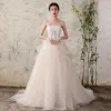 Chic / Beautiful Champagne Wedding Dresses 2018 Ball Gown Lace Sequins Organza Cascading Ruffles Strapless Sleeveless Backless Cathedral Train Wedding