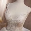 Charmant Beige Perle En Dentelle Fleur Courte Robe De Fête 2024 Bretelles Spaghetti Sans Manches Dos Nu Noeud Robe De Ceremonie