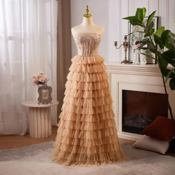 Charmant Doré Perlage Paillettes Perle Plissée Robe De Bal 2024 Princesse Bustier Sans Manches Dos Nu Longue Promo Robe De Ceremonie