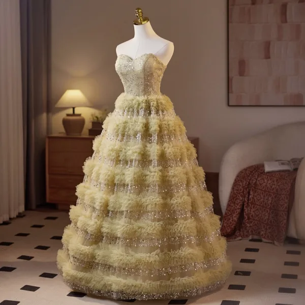 Scintillantes Doré Perlage Paillettes Volants Robe De Bal 2025 Robe Boule Bustier Sans Manches Dos Nu Longue Promo Robe De Ceremonie
