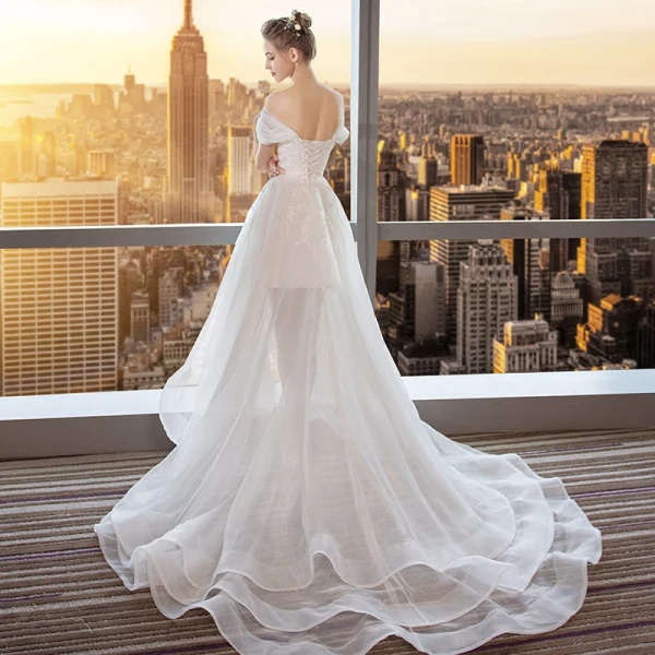 Moderne / Mode Haute Basse Blanche Robe De Mariée 2018 Princesse Appliques En Dentelle De l'épaule Dos Nu Sans Manches Tribunal Train Mariage