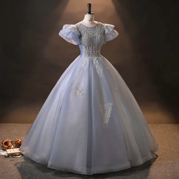 Vintage / Retro Quinceañera Prom Dresses 2024 Sky Blue Crossed Straps Beading Pearl Tulle Cap Sleeves Ball Gown Formal Dresses
