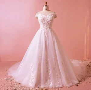 Charmant Ivoire Grande Taille Robe De Mariée 2018 Princesse Sans Manches U Cou Tulle Lacer Appliques Dos Nu Perlage Paillettes Mariage