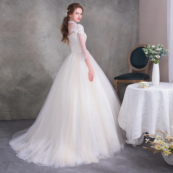 Vintage Ivory See-through Wedding Dresses 2018 Ball Gown High Neck 3/4 Sleeve Backless Appliques Flower Beading Pearl Ruffle Court Train