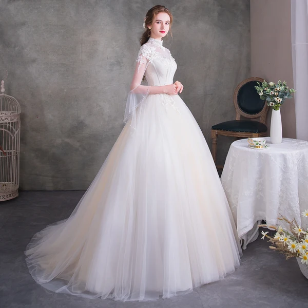 Vintage Ivory See-through Wedding Dresses 2018 Ball Gown High Neck 3/4 Sleeve Backless Appliques Flower Beading Pearl Ruffle Court Train