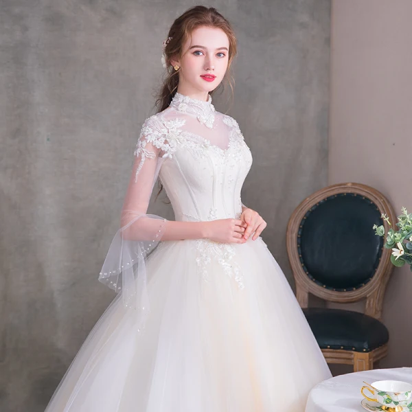 Vintage Ivory See-through Wedding Dresses 2018 Ball Gown High Neck 3/4 Sleeve Backless Appliques Flower Beading Pearl Ruffle Court Train