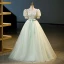 Élégant Vert Cendré Paillettes Appliques Robe De Bal 2023 Robe Boule V-Cou Manches Courtes Dos Nu Noeud Ceinture Longue Promo Robe De Ceremonie