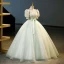 Élégant Vert Cendré Paillettes Appliques Robe De Bal 2023 Robe Boule V-Cou Manches Courtes Dos Nu Noeud Ceinture Longue Promo Robe De Ceremonie