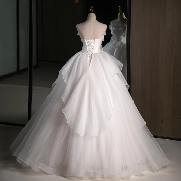 Modern / Fashion White Cascading Ruffles Wedding Dresses 2023 Ball Gown Strapless Bow Sleeveless Backless Floor-Length / Long Wedding