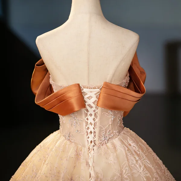 Élégant Beige Faux Diamant En Dentelle Fleur Robe De Bal 2025 Robe Boule Bustier Noeud Sans Manches Dos Nu Longue Promo Robe De Ceremonie