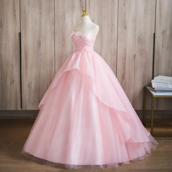 Elegant Blushing Pink Pearl Appliques Cascading Ruffles Prom Dresses 2024 Ball Gown Strapless Sleeveless Backless Floor-Length / Long Prom Formal Dresses