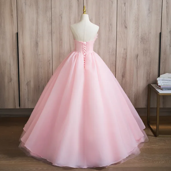 Elegant Blushing Pink Pearl Appliques Cascading Ruffles Prom Dresses 2024 Ball Gown Strapless Sleeveless Backless Floor-Length / Long Prom Formal Dresses
