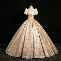 Elegantes Oro Ball Gown Vestidos de gala 2024 Escote Cuadrado Manga Corta Sin Espalda Largos Gala Vestidos Formales