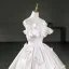 Chic / Beautiful Ivory Pearl Bow Short Homecoming Graduation Dresses 2026 Strapless Ball Gown Sleeveless Backless Formal Dresses