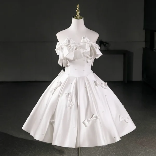 Chic / Beautiful Ivory Pearl Bow Short Homecoming Graduation Dresses 2026 Strapless Ball Gown Sleeveless Backless Formal Dresses