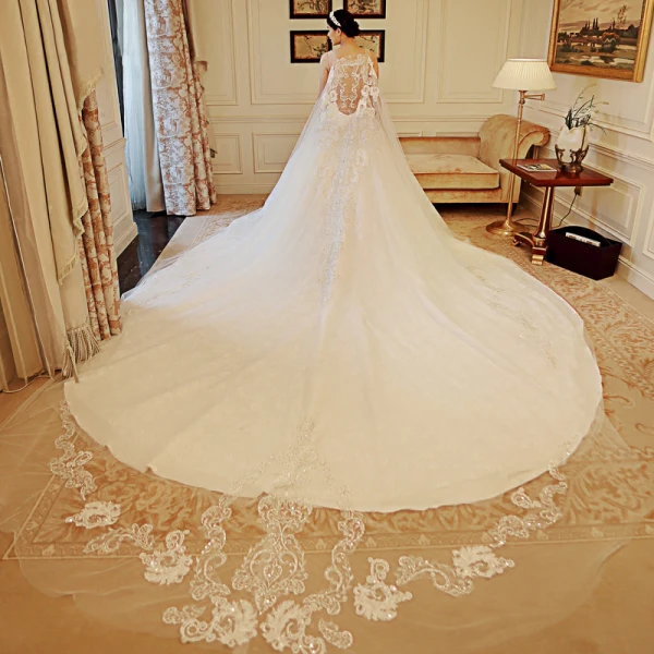 Luxury / Gorgeous Ivory See-through Wedding Dresses 2018 A-Line / Princess Scoop Neck Sleeveless Appliques Lace Beading Crystal Rhinestone Ruffle Royal Train