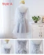 Hög Låg Grå Genomskinliga Sommar Tärnklänningar 2018 Prinsessa Appliqués Spets Asymmetrisk Ruffle Halterneck Klänning Till Bröllop
