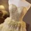 Scintillantes Doré Perlage Paillettes Volants Robe De Bal 2025 Robe Boule Bustier Sans Manches Dos Nu Longue Promo Robe De Ceremonie