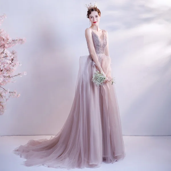 Charmant Perle Rose Robe De Bal 2021 Princesse Col v profond Perlage Paillettes Sans Manches Dos Nu Train De Balayage Robe De Ceremonie