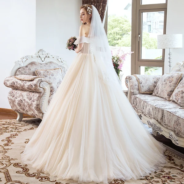 Charmant Champagne Robe De Mariée 2019 Princesse Perlage Cristal Perle Paillettes Bustier Dos Nu Sans Manches Longue
