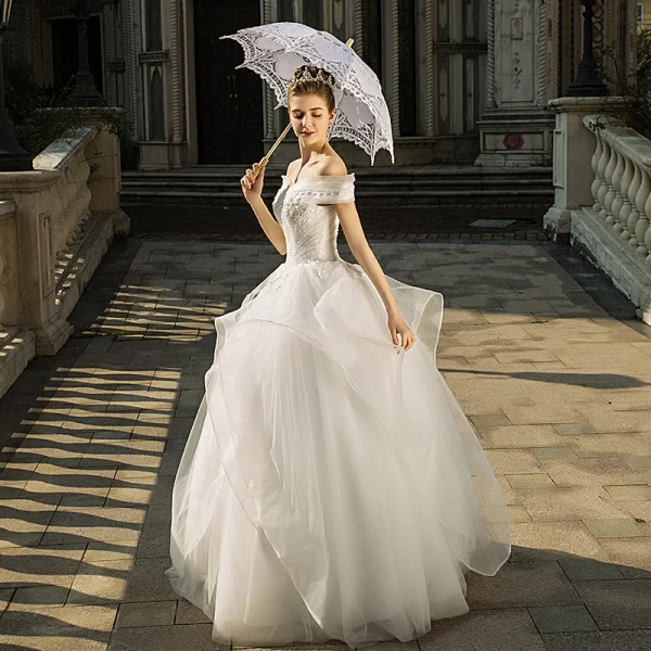 Élégant Ivoire Robe De Mariée 2018 Robe Boule Dentelle Perlage Cristal Paillettes Volants en Cascade De l'épaule Dos Nu Sans Manches Longue Mariage