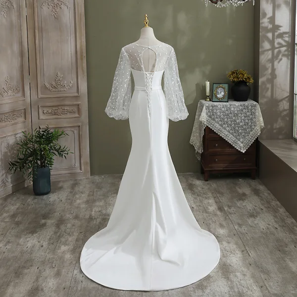 Mode Ivory / Creme Meerjungfrau Brautkleider / Hochzeitskleider 2021 Rundhalsausschnitt Pailletten Schleife Spitze Blumen Lange Ärmel Rückenfreies Sweep / Pinsel Zug Hochzeit