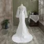 Mode Ivory / Creme Meerjungfrau Brautkleider / Hochzeitskleider 2021 Rundhalsausschnitt Pailletten Schleife Spitze Blumen Lange Ärmel Rückenfreies Sweep / Pinsel Zug Hochzeit